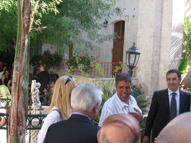 Vassula with Mr. Akel Biltaji on her right in the gardens of St. Margaret's, Nazareth