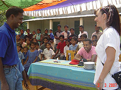 Before giving the scholarships