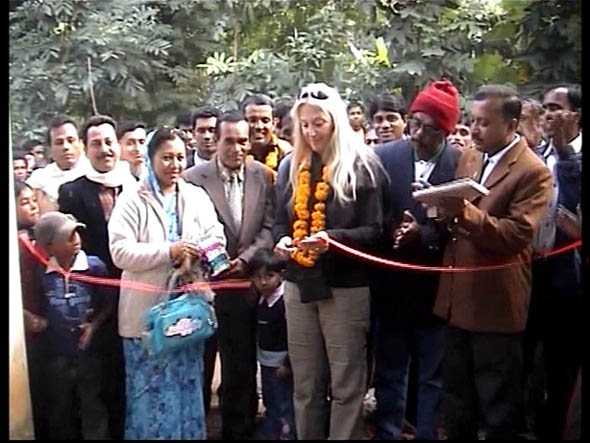 Vassula cutting the red ribbon of the TLIG school in Kulun