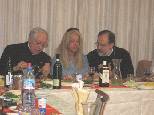 Vassula with Archbishop Georges and Fr. Habiby to her right, at lunch
in Shefar'am, Nazareth